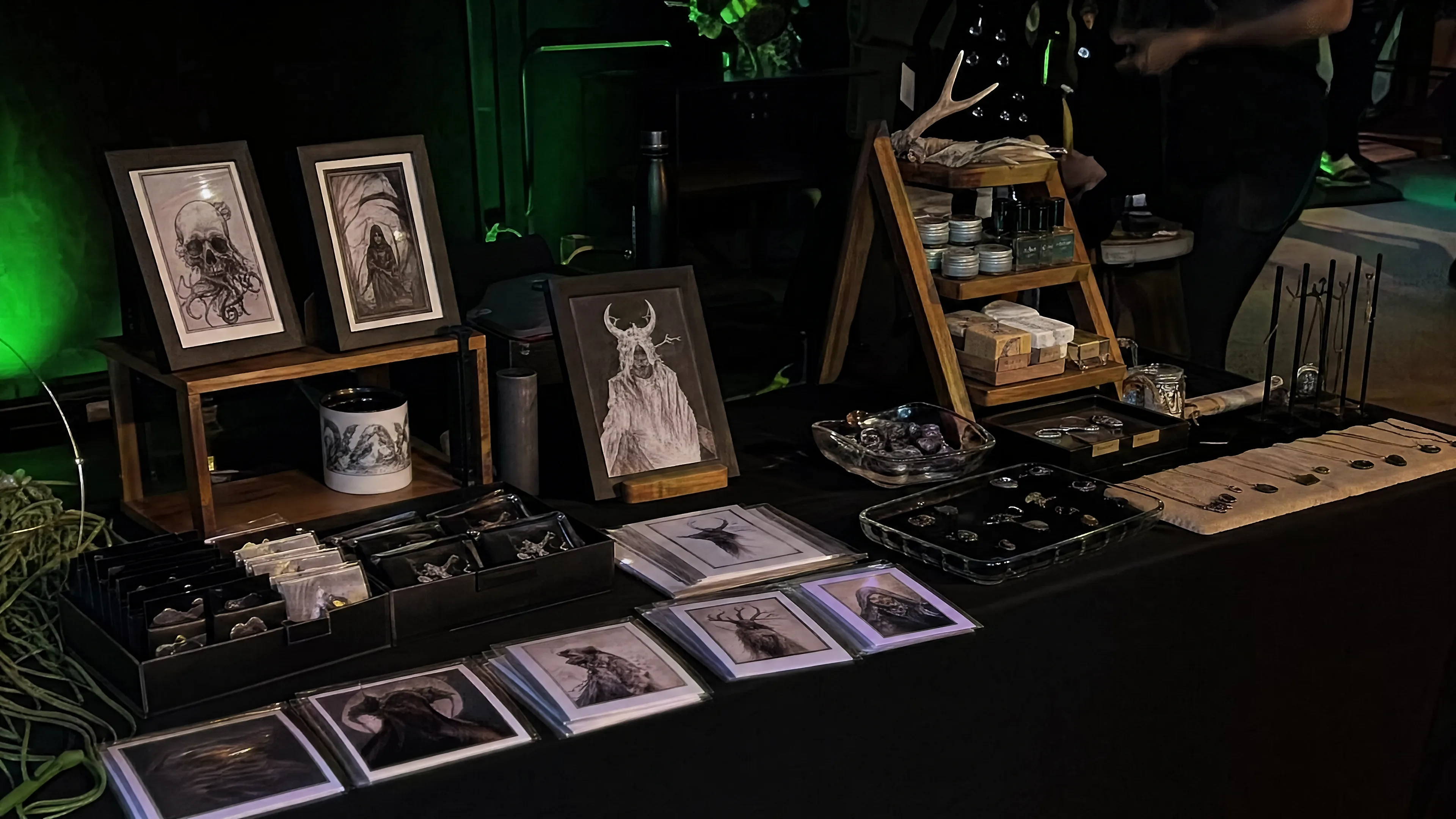 Vendor booth with art prints and product display