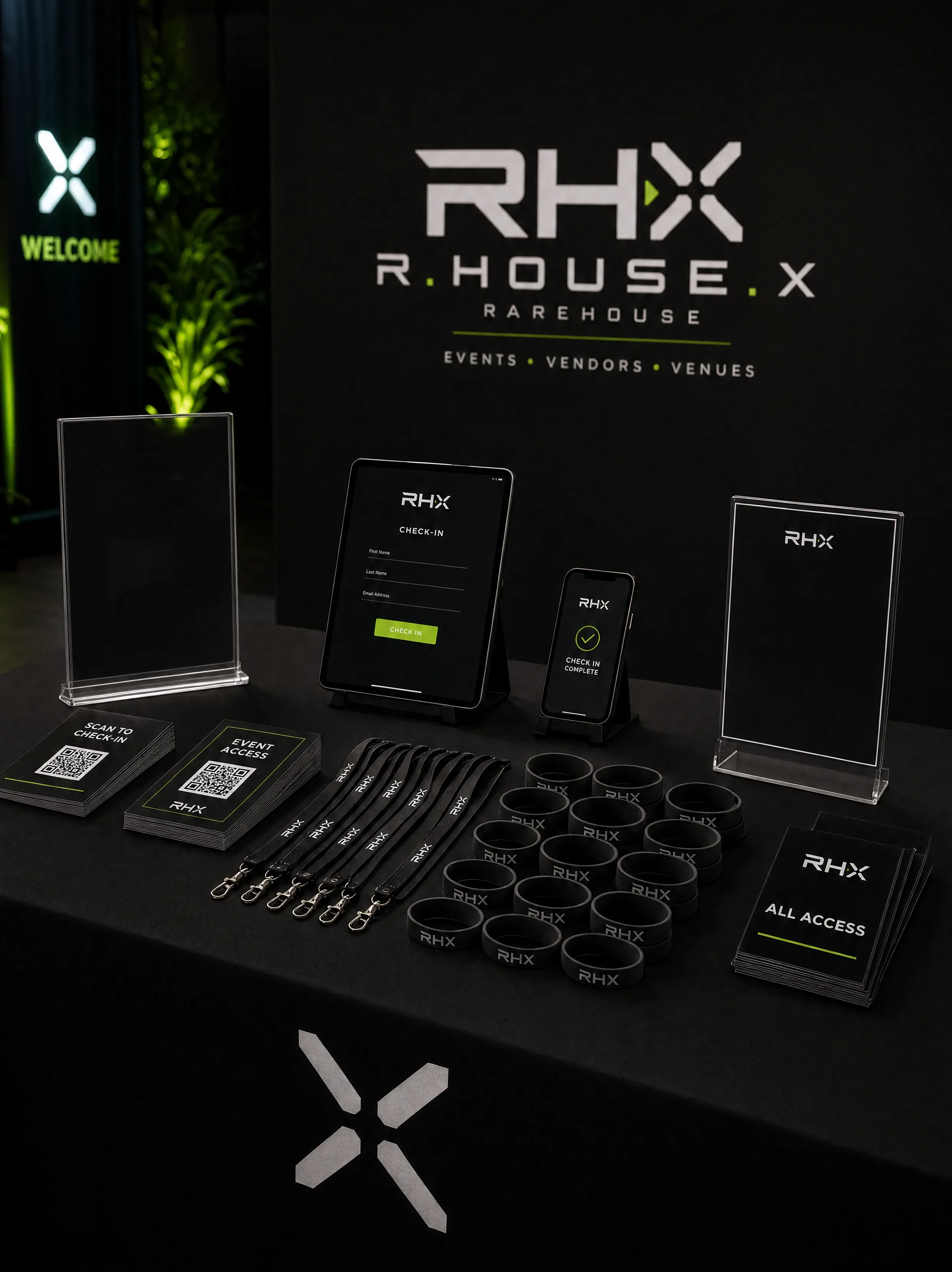 RHX check-in desk with wristbands, lanyards, and pass materials
