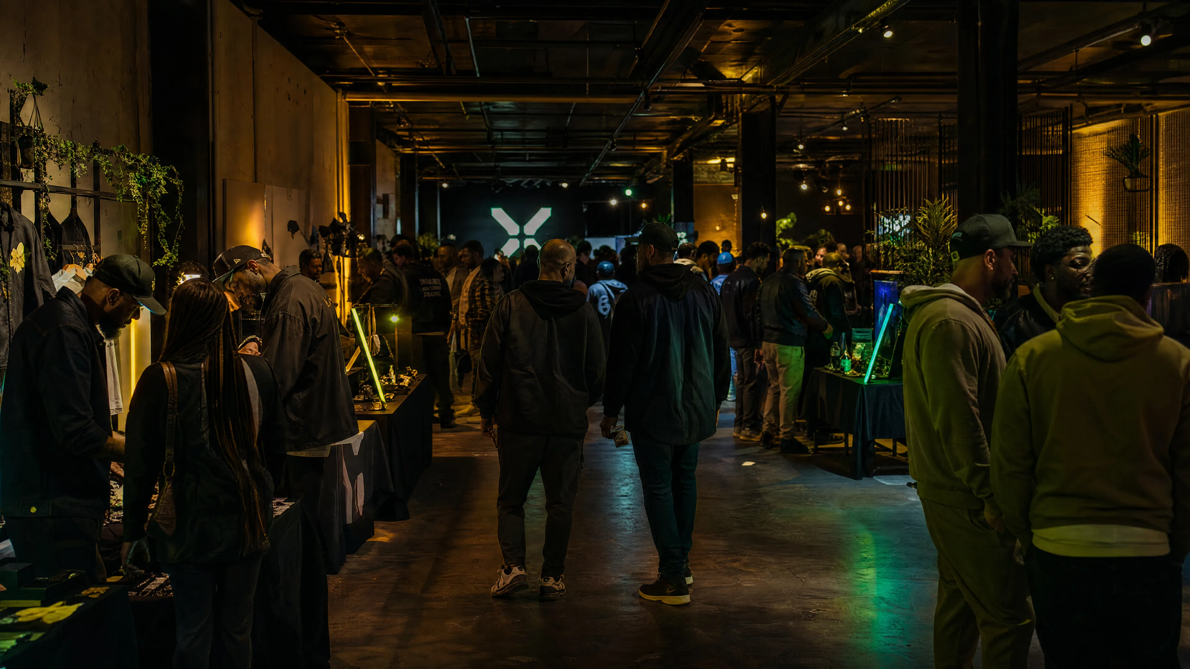 Guests browsing vendor tables at an RHX event